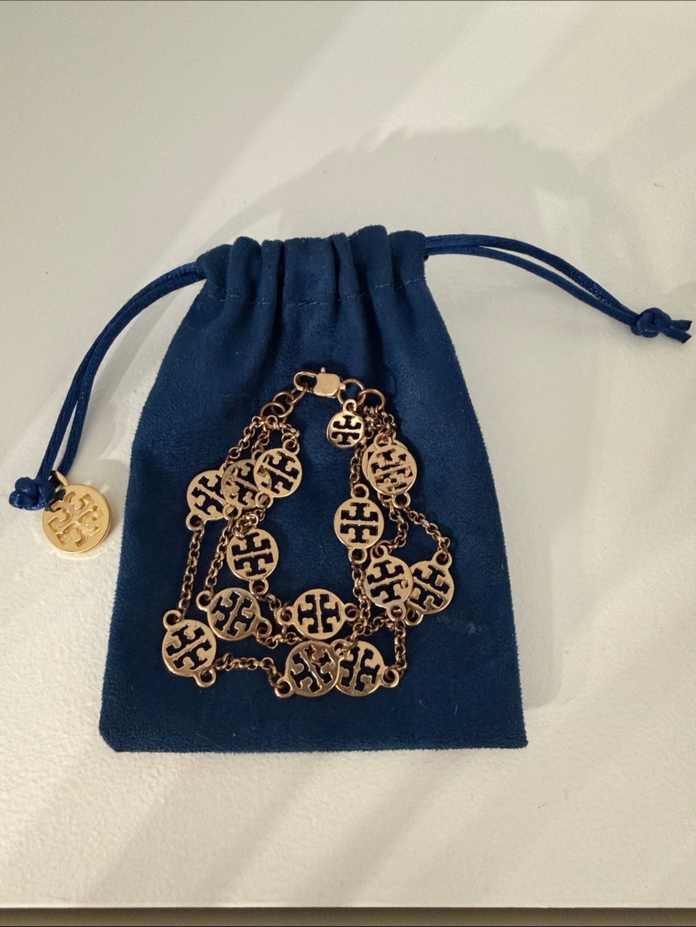 Tory Burch Yellow Gold Triple Strand Logo Medallion Chain Bracelet